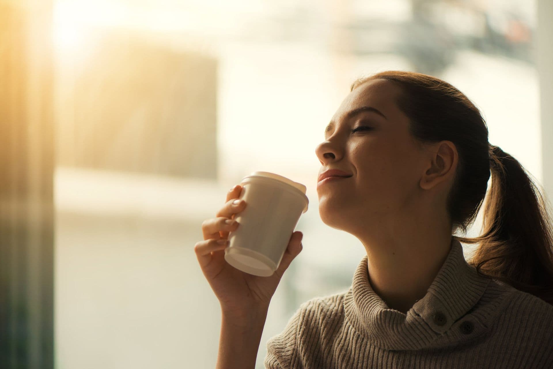 Woman smelling fresh air
